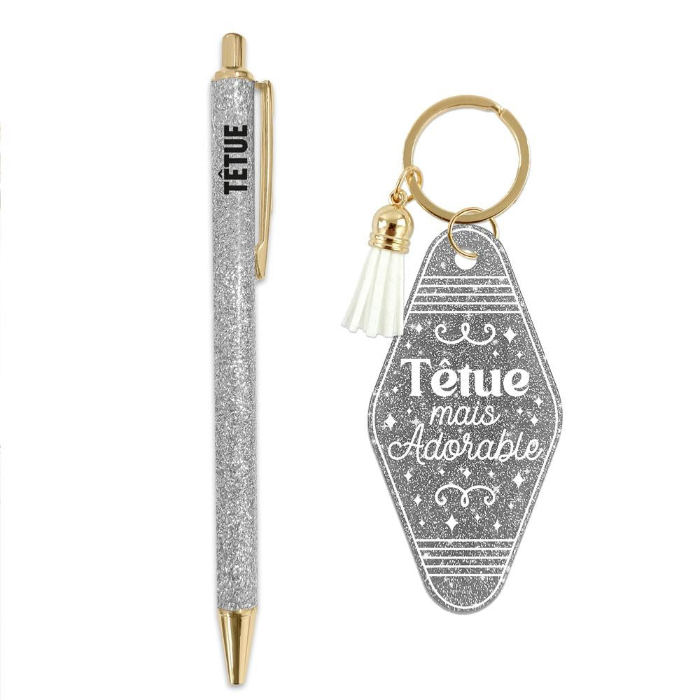 🤍 Duo pailleté – Porte-clés & stylo “Têtue mais adorable” ✨