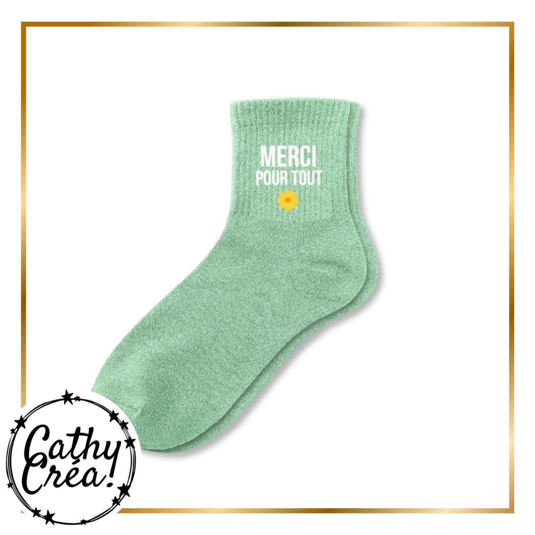 Chaussette a paillettes vert menthe inscription Merci pour tout en blanc avec fleur jaune